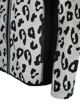 Leopardenmuster-Reißverschlussjacke mit schwarz-weißem Muster, Polyester-Material.