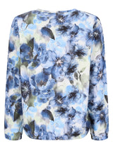 Blause mit blauem Blumenmuster, langen Ärmeln und rundem Ausschnitt.