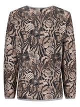 Bluse mit Blumenstickerei in gedämpften Tönen und zarter, spitzenartiger Textur.