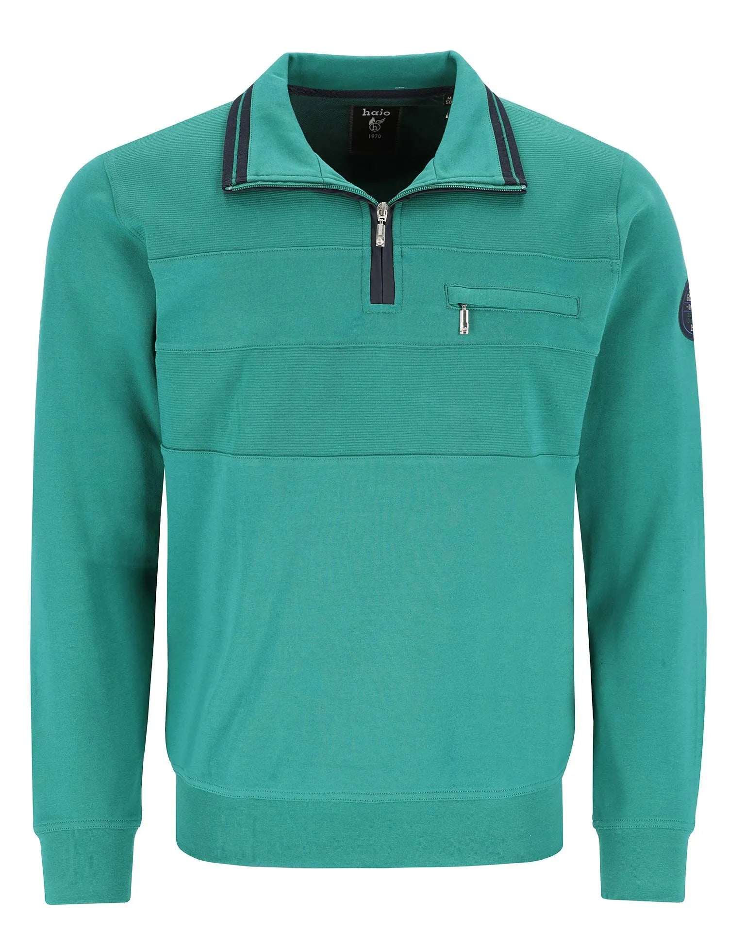 Grüner Pullover mit Reißverschluss, schwarzem Saum und Taschen-Details.